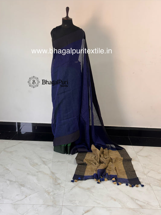 Navy blue pure linen saree with emerald green giccha pallu, elegant handloom linen saree for festive wear.