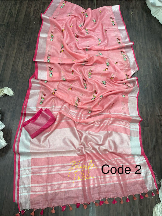 Peach linen saree with elegant handwork design, lightweight and perfect for party and festive wear