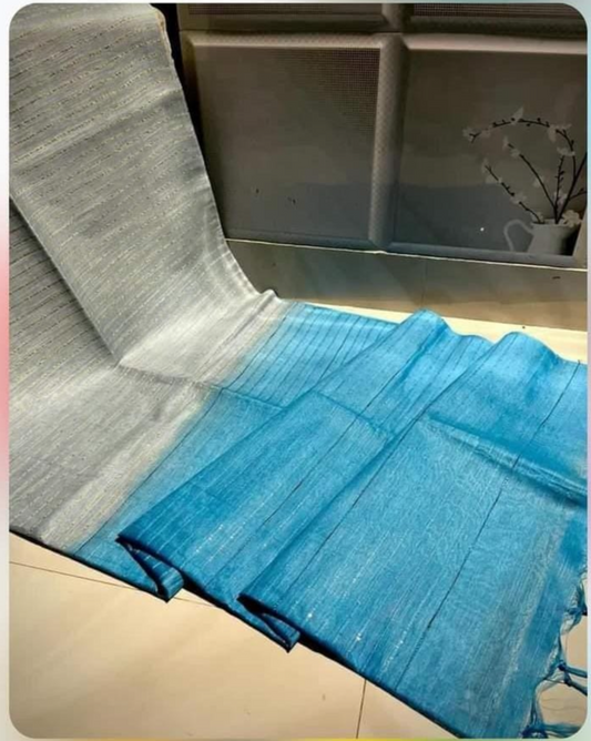 Turquoise grey multi color tie dye saree with artistic patterns and stylish ethnic look for festive and party wear.
