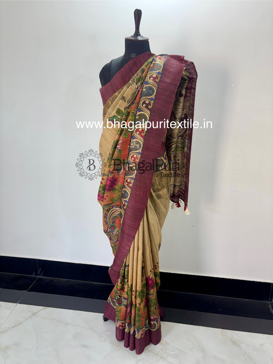 Tussar Ghicha silk saree with elegant digital prints, lightweight texture, and natural golden sheen β perfect for festive and ethnic wear.