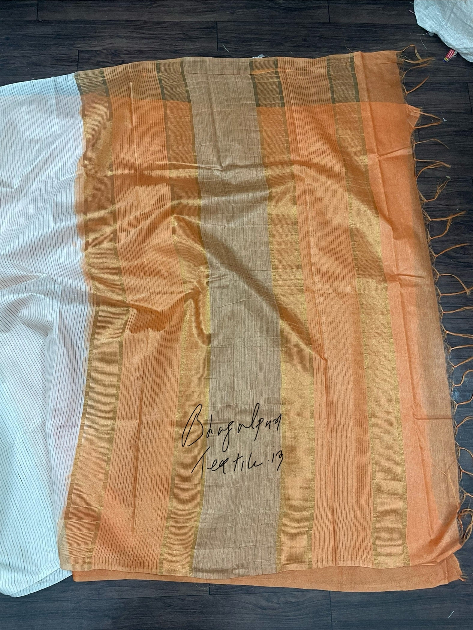 Bhagalpuri creamish orange soft silk saree for women with elegant drape, ideal for wedding, festive and party wear