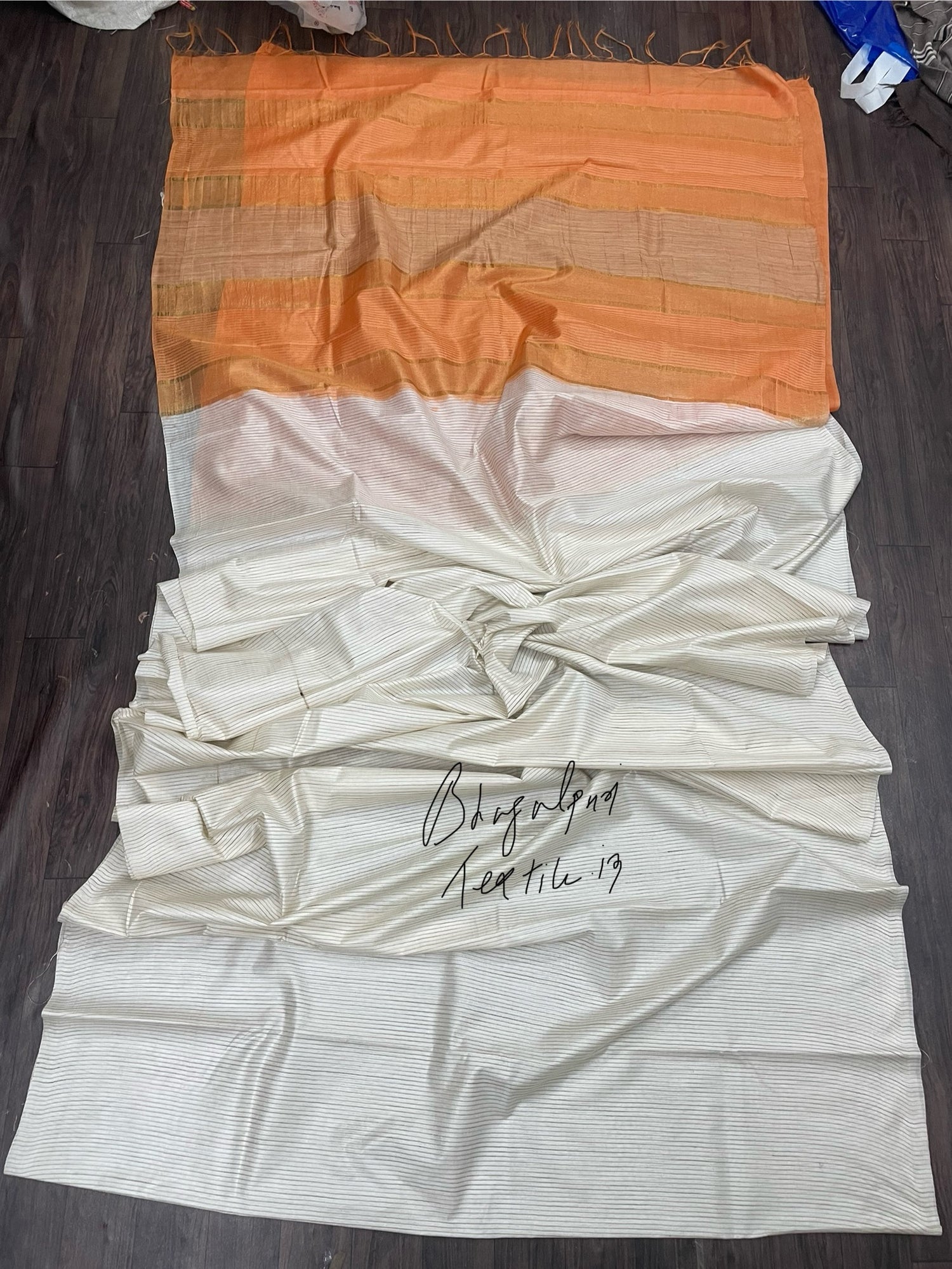 Bhagalpuri soft silk creamish orange saree for women, lightweight and elegant for party and festive occasions