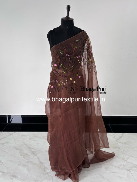 Coffee brown organza saree with hand embroidery and designer 1 meter work border for wedding and party wear.