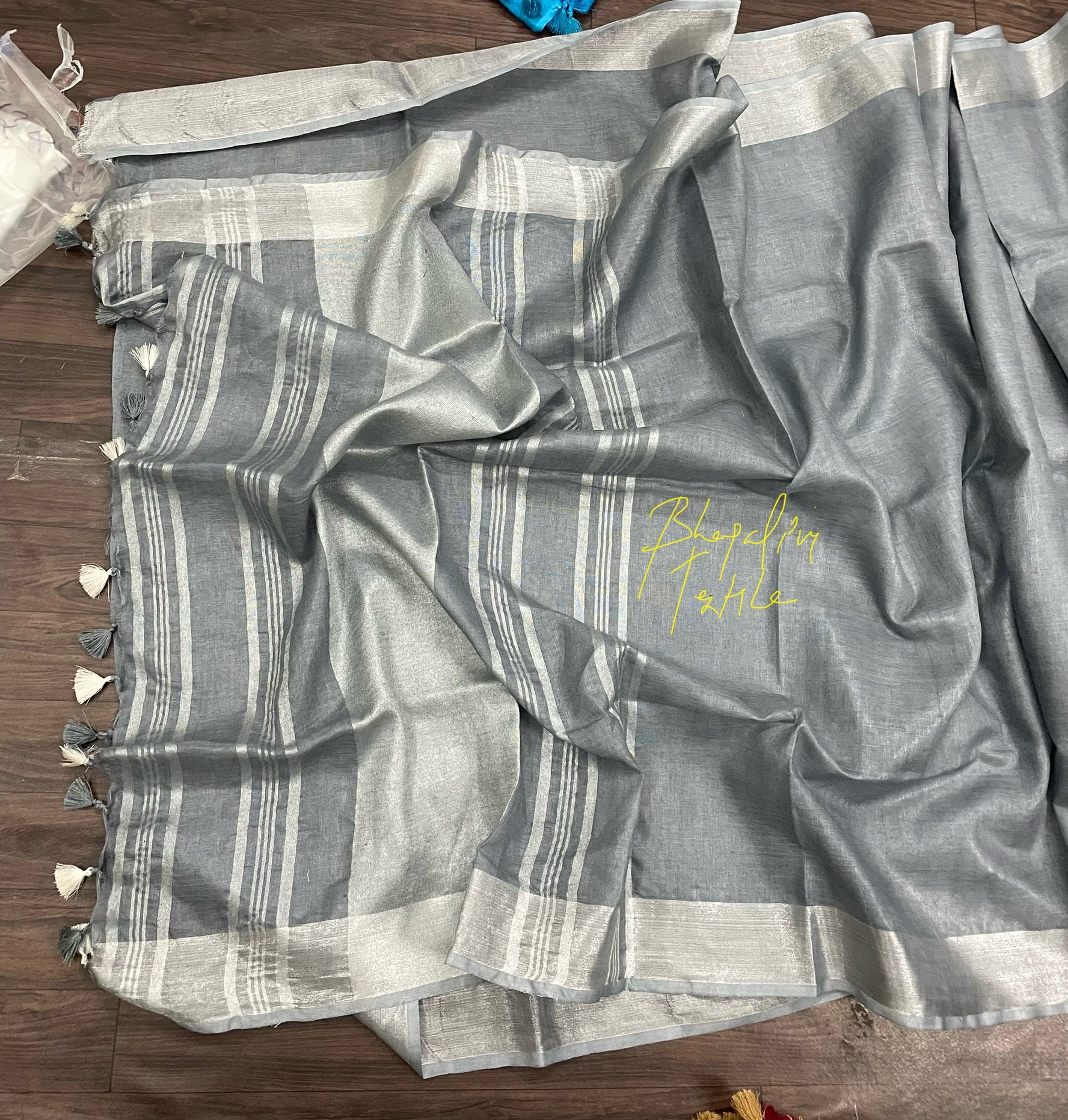 Designer ash grey linen saree with soft texture, comfortable and stylish for office, party and casual wear