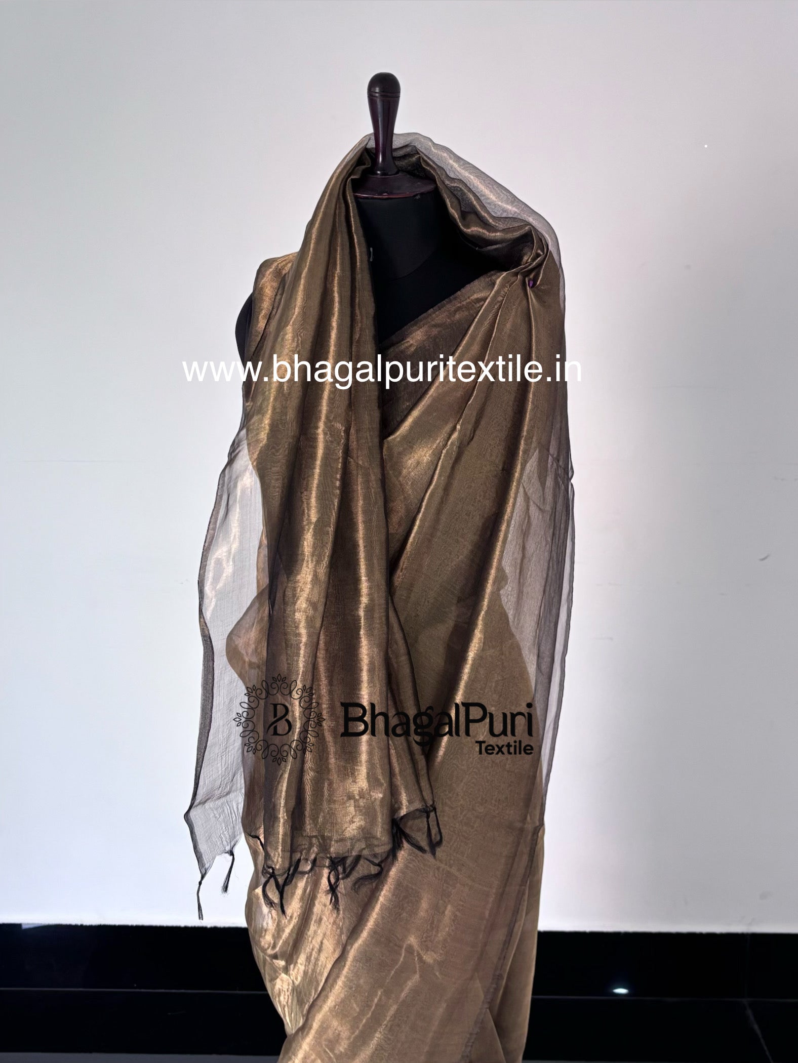 Designer black tissue silk saree with 1 meter running blouse piece, elegant lightweight saree for weddings, receptions, and festive celebrations.