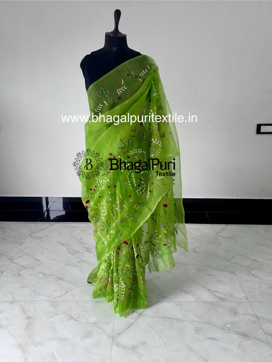 Designer organza silk hand embroidered saree for festive and party wear.
