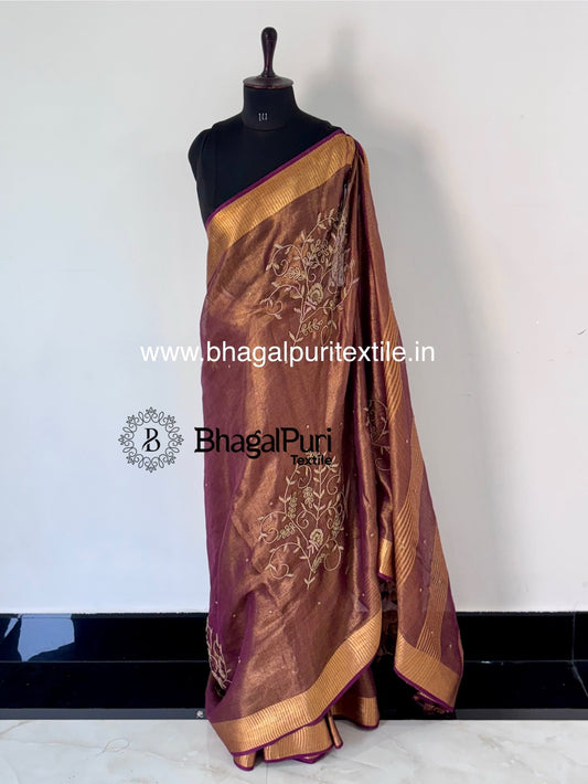 Elegant tissue silk saree with beads work, perfect for festive and party wear.