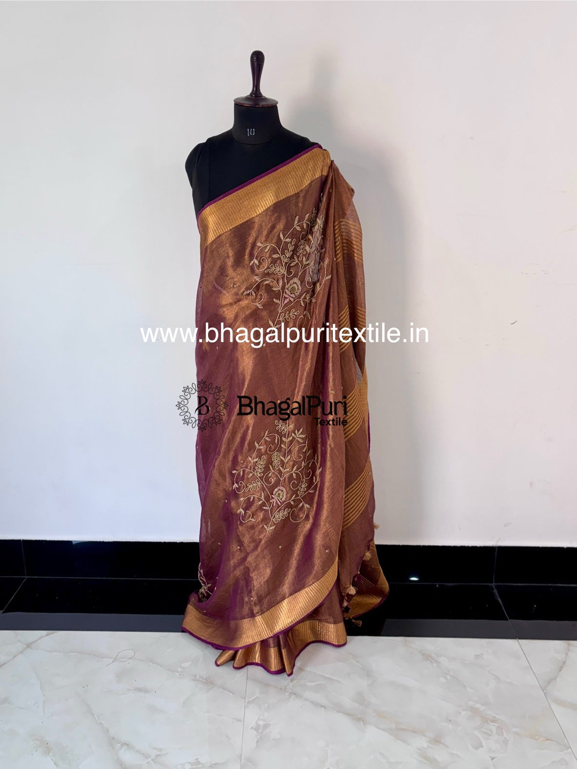 Classic tissue silk saree with detailed beads work for bridal and festive wear.