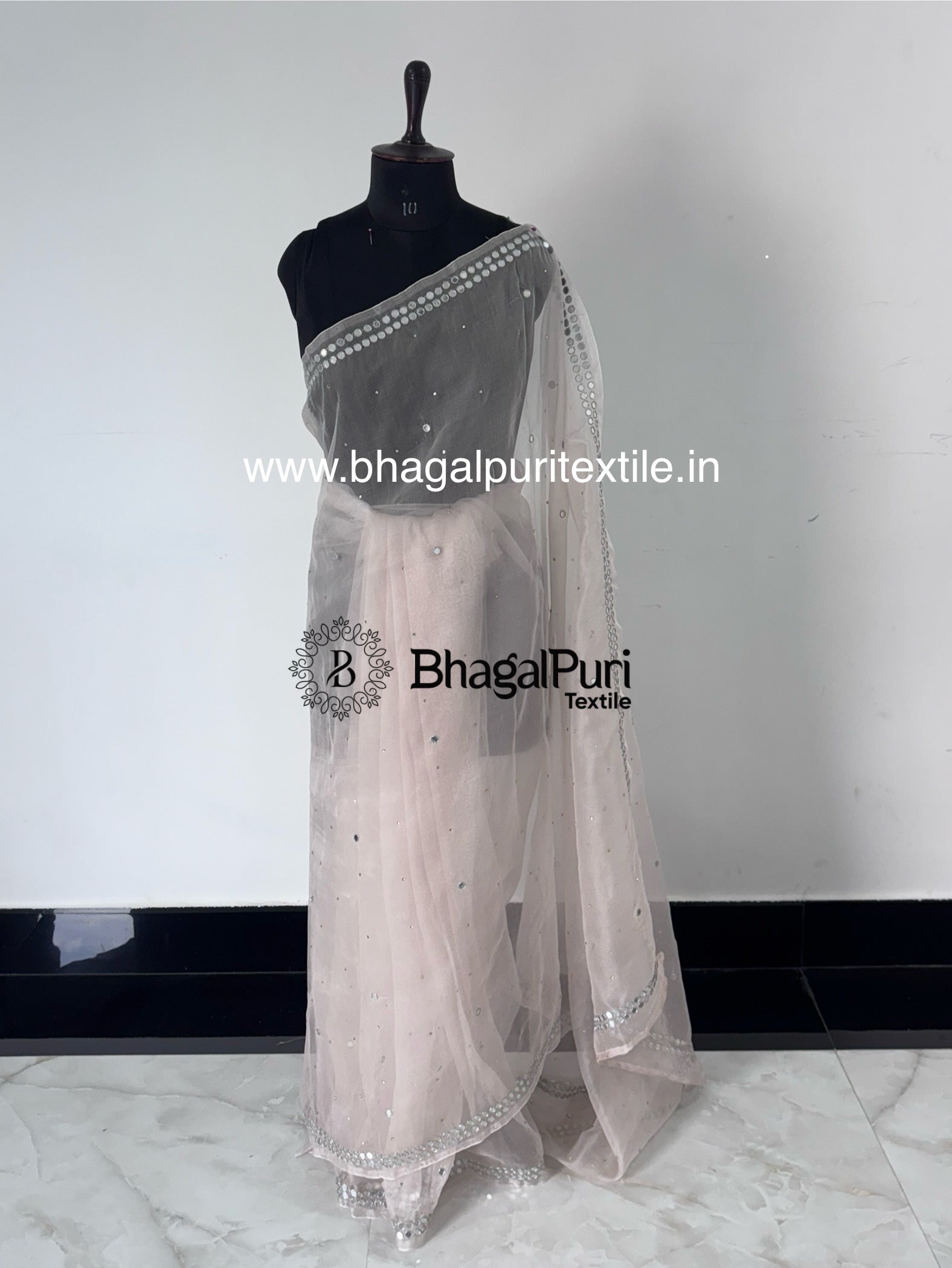 Designer organza saree featuring mirror embroidery, stylish festive wear saree for Navratri and Diwali functions.