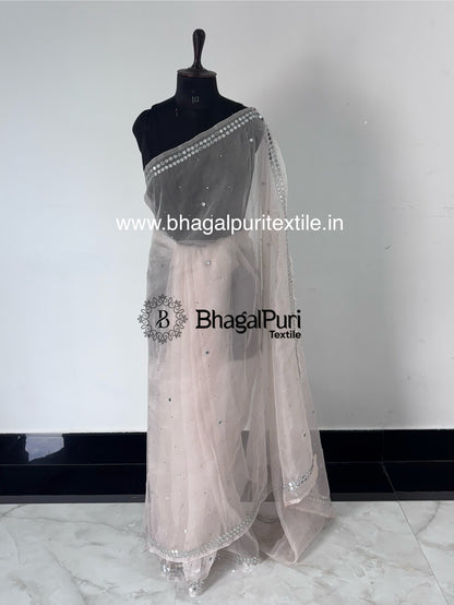 Designer organza saree featuring mirror embroidery, stylish festive wear saree for Navratri and Diwali functions.