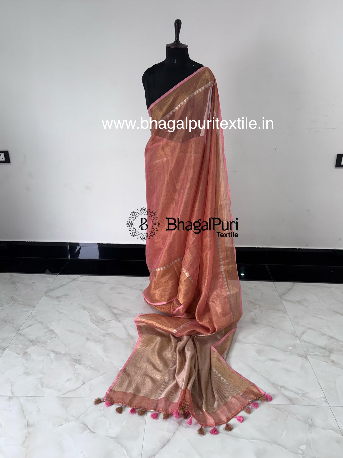 Peach linen temple tissue saree with zari temple border elegant traditional Indian saree