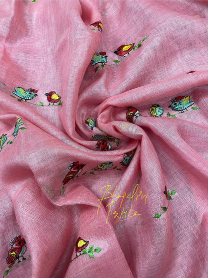 Peach tissue linen saree with designer detailing, ideal for wedding, party and festive occasions