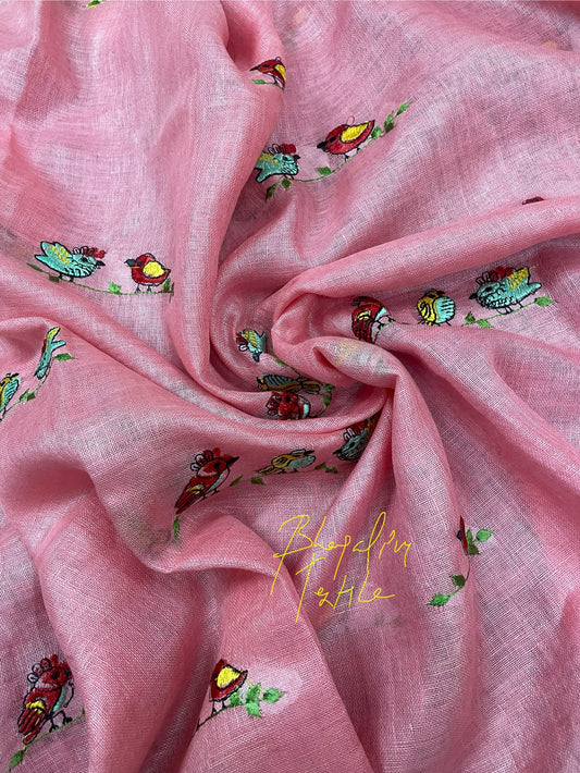 Peach tissue linen saree with designer detailing, ideal for wedding, party and festive occasions