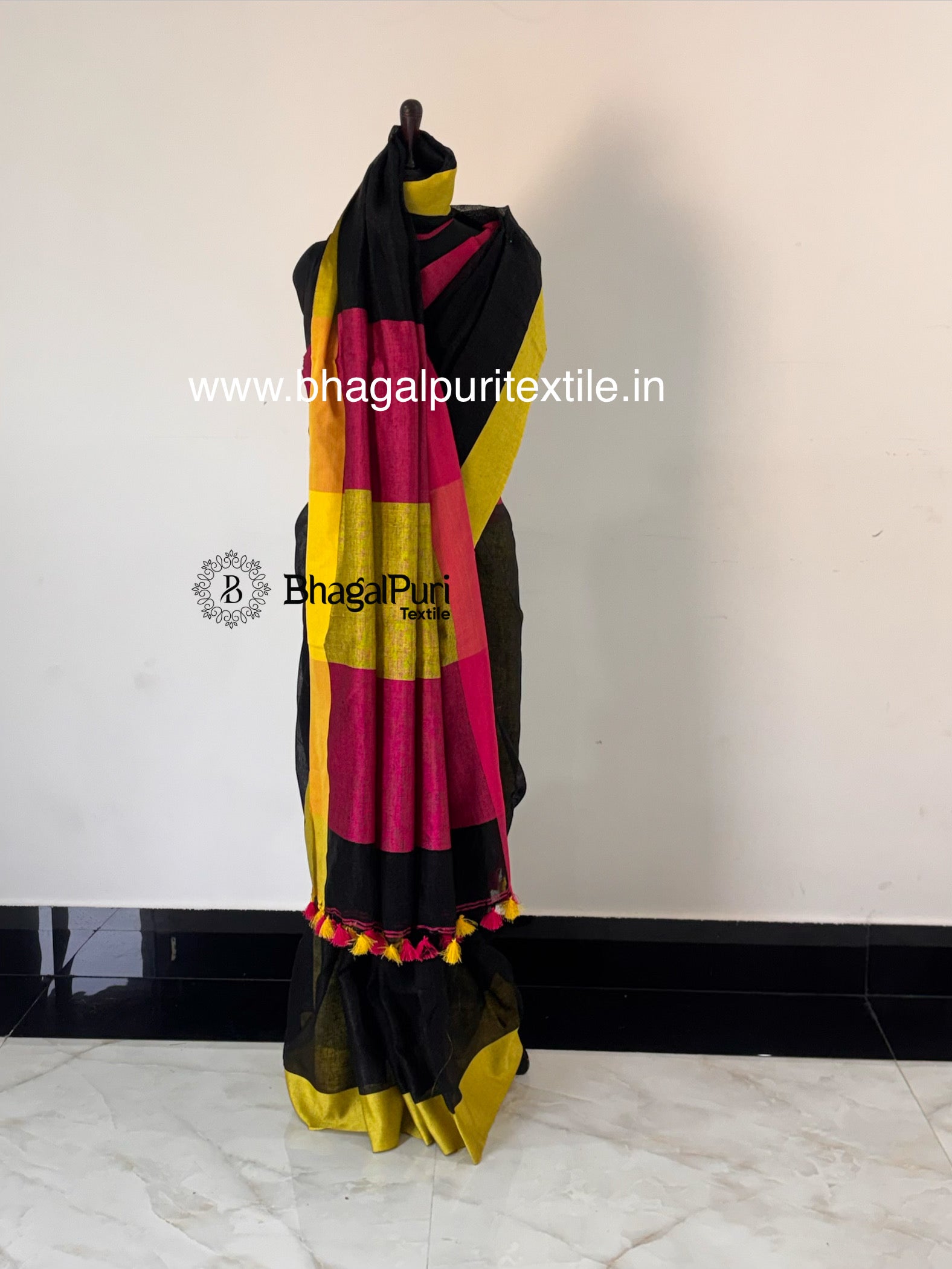 Black linen yarn dye saree with vibrant multicolor border and rich multicolor pallu