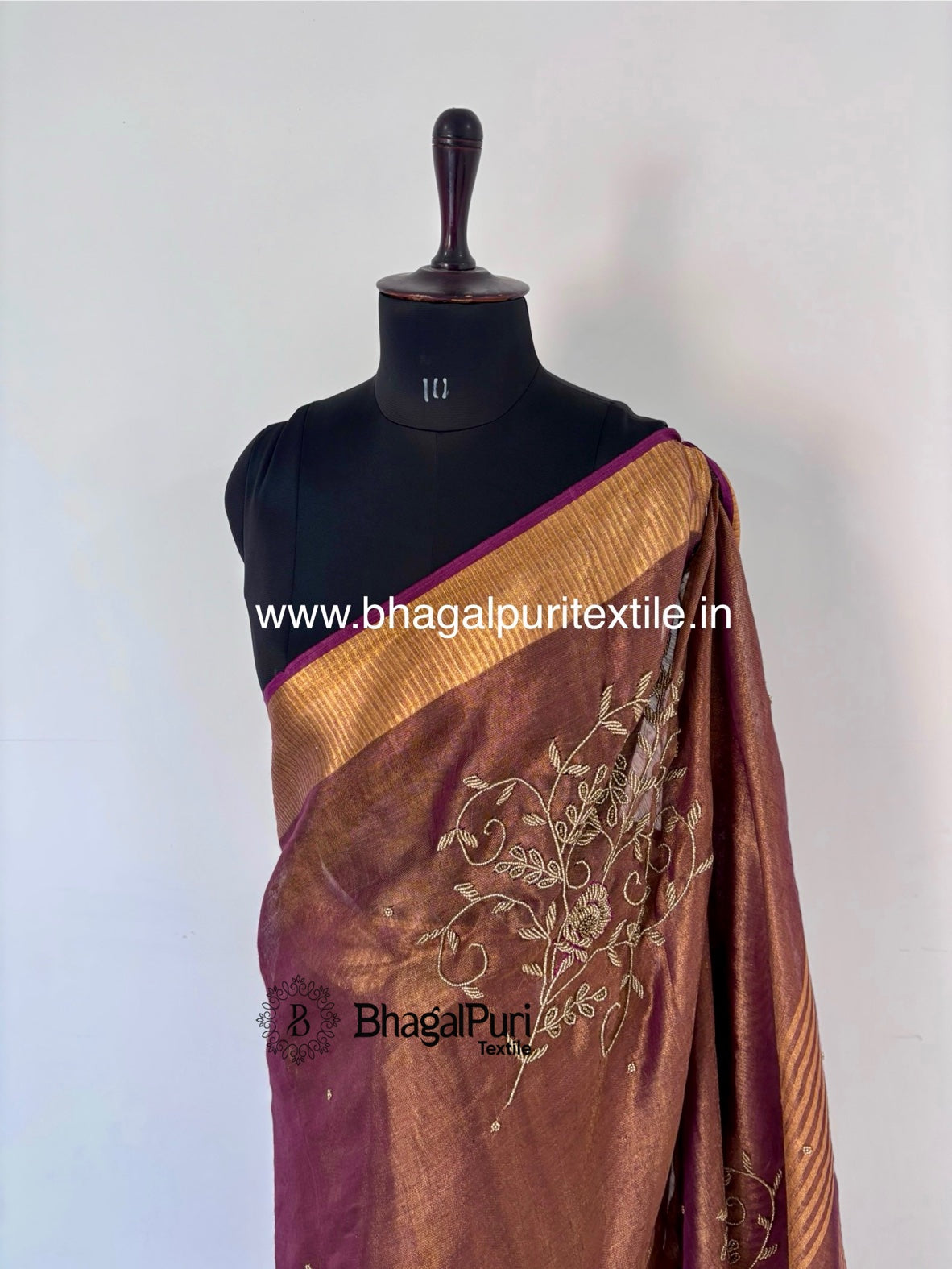 Designer tissue saree with fine beads embellishment for weddings and occasions.