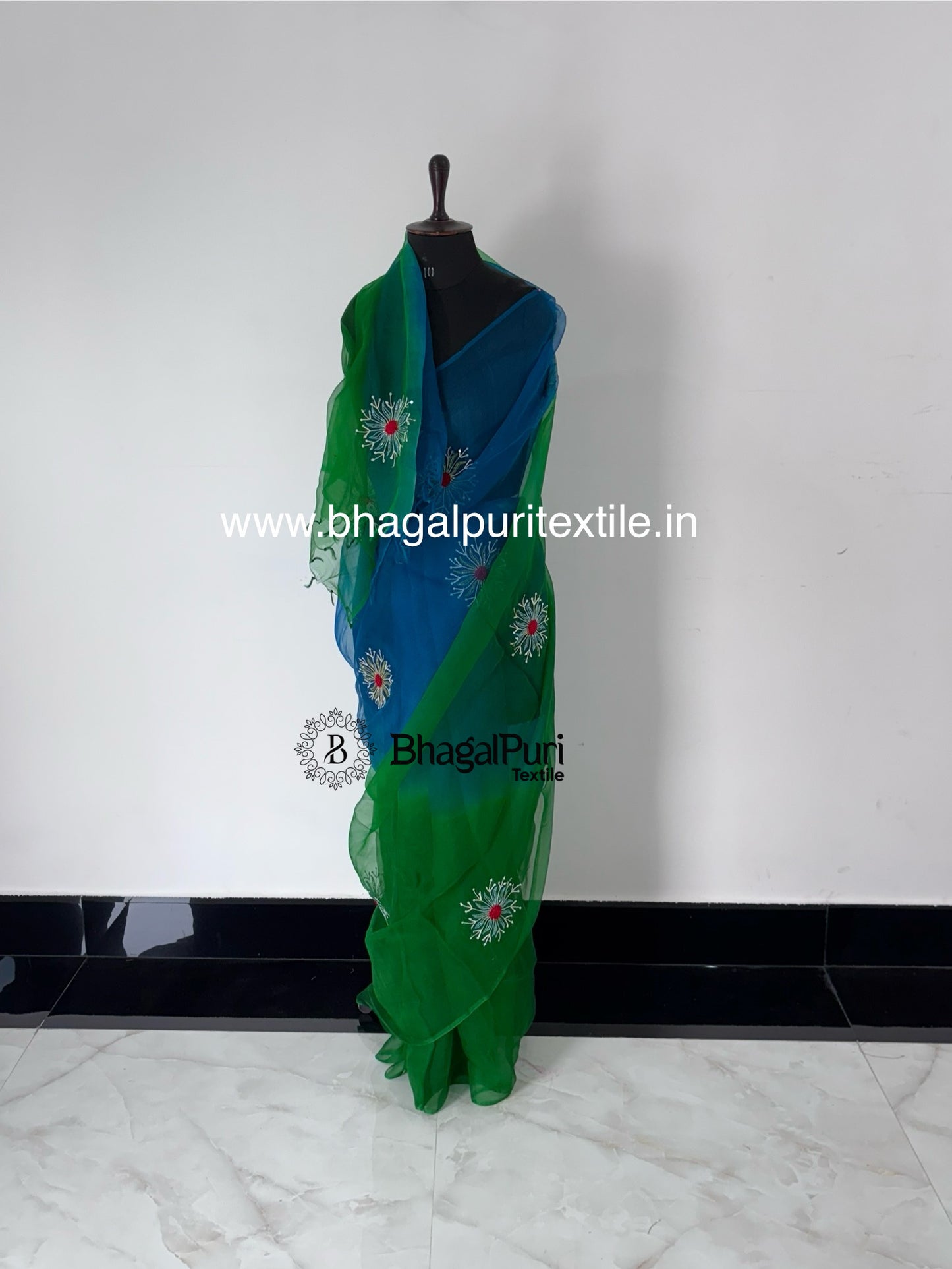 Lightweight organza silk saree with handcrafted embroidery for festive occasions