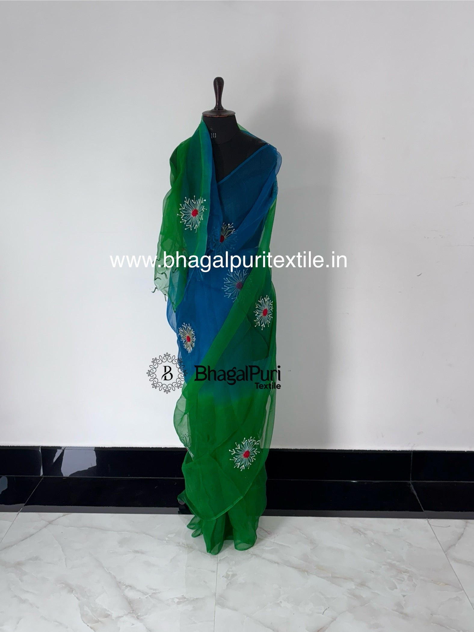 Lightweight organza silk saree with handcrafted embroidery for festive occasions