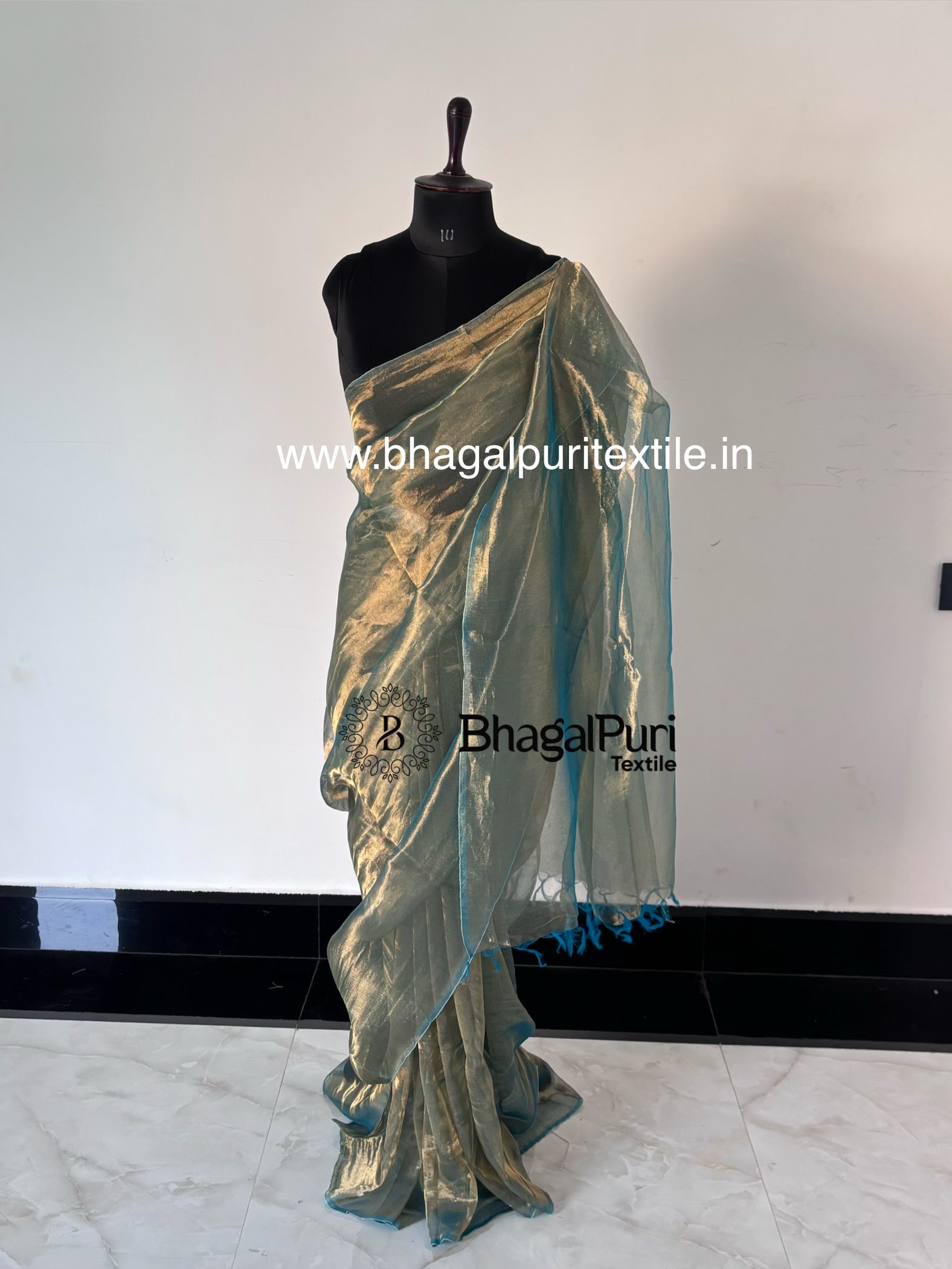 designer tissue silk saree in turquoise color