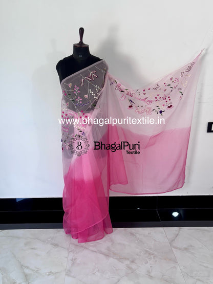 White and pink organza saree in stylish partywear design with lightweight drape and elegant finish.